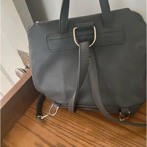 Slightly used grey backpack